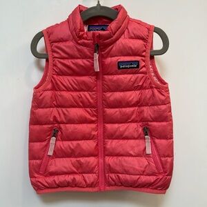 Girls down Patagonia vest. Full zip w pockets. 9/10 condition. Salmon pink.